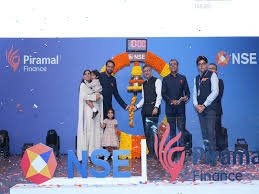 Piramal Finance lists on the NSE! Find out how Piramal Finance got listed without an IPO at a 12% premium. Plus, the viral moment of Nita Ambani gracefully handles grandson.